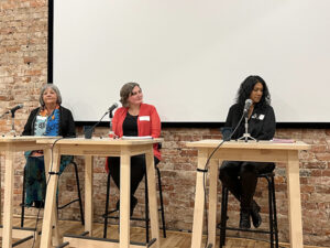 Three speakers doing question and answers